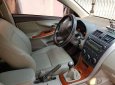 Toyota Corolla altis 1.8MT 2009 - Cần bán lại xe Toyota Corolla altis 1.8MT đời 2009, màu đen số sàn 