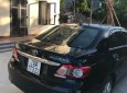 Toyota Corolla altis 2014 - Chính chủ bán lại xe Toyota Corolla altis đời 2014, màu đen