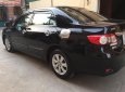 Toyota Corolla altis 2014 - Gia đình bán Toyota Corolla altis đời 2014, màu đen số tự động, 548tr