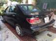 Toyota Corolla altis 1.8G MT 2005 - Bán Toyota Corolla altis 1.8G MT sản xuất năm 2005, màu đen số sàn, giá chỉ 285 triệu