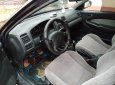 Mazda 323 2000 - Bán Mazda 323 2000, còn tương đối nguyên bản, màu xanh đen quyền lực