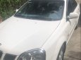 Daewoo Lacetti  MT 2004 - Bán ô tô Daewoo Lacetti MT sản xuất năm 2004, màu trắng, nội thất zin nguyên bản