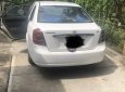 Daewoo Lacetti  MT 2004 - Bán ô tô Daewoo Lacetti MT sản xuất năm 2004, màu trắng, nội thất zin nguyên bản