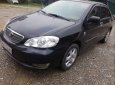 Toyota Corolla altis   2004 - Bán Toyota Corolla Altis đời 2004, màu đen, tương đối đẹp, mọi chức lăng ok