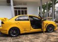 Mitsubishi Lancer EX Sport 2010 - Cần bán gấp Mitsubishi Lancer EX Sport đời 2010, màu vàng, nhập khẩu nguyên chiếc