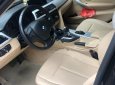 BMW 3 Series 320i 2012 - Bán xe BMW 3 Series 320i sản xuất 2012, màu đen, nhập khẩu còn mới 