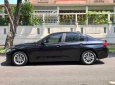 BMW 3 Series 320i 2013 - Bán xe BMW 320i năm 2013, màu đen nhập 860 triệu
