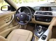 BMW 3 Series 320i 2013 - Bán xe BMW 320i năm 2013, màu đen nhập 860 triệu