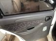 Daewoo Lanos   2003 - Cần bán gấp Daewoo Lanos năm sản xuất 2003, màu trắng, côn số ngọt ngào