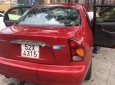 Daewoo Lanos SX 2004 - Cần bán xe Daewoo Lanos SX sản xuất 2004, màu đỏ số sàn, 120tr