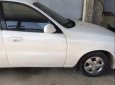 Daewoo Lanos   2003 - Cần bán gấp Daewoo Lanos năm sản xuất 2003, màu trắng, côn số ngọt ngào