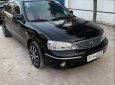 Ford Laser 2004 - Cần bán gấp Ford Laser 2004, màu đen