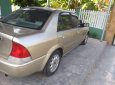 Ford Laser 2000 - Cần bán gấp Ford Laser đời 2000, màu vàng, nhập khẩu, 150tr