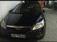 Ford Focus  1.8 MT   2010 - Bán gấp Ford Focus 1.8 MT 2010, màu đen