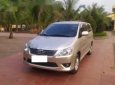 Toyota Innova    2.0E 2012 - Gia đình cần bán chiếc xe ô tô Toyota Innova 2.0E màu ghi vàng, Sx 2012, sử dụng 2013