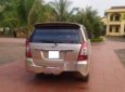 Toyota Innova    2.0E 2012 - Gia đình cần bán chiếc xe ô tô Toyota Innova 2.0E màu ghi vàng, Sx 2012, sử dụng 2013