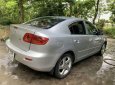 Mazda 3 AT 2004 - Cần bán lại xe Mazda 3 AT sản xuất năm 2004, màu bạc