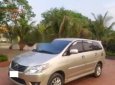 Toyota Innova    2.0E 2012 - Gia đình cần bán chiếc xe ô tô Toyota Innova 2.0E màu ghi vàng, Sx 2012, sử dụng 2013