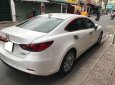 Mazda 6 2016 - Cần bán lại xe Mazda 6 đời 2016, màu trắng, còn mới, giá 696tr