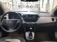 Hyundai Grand i10   1.0 AT 2015 - Bán Hyundai Grand i10 1.0 AT sản xuất năm 2015, màu trắng, nhập khẩu nguyên chiếc  