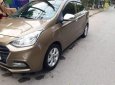 Hyundai Grand i10 2018 - Bán Hyundai Grand i10 năm 2018, màu nâu số tự động