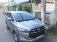 Toyota Innova E 2018 - Bán gấp xe Innova 2018 số sàn màu xám rất mới