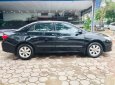 Toyota Corolla altis 2010 - Cần bán Toyota Corolla Altis đời 2010, màu đen