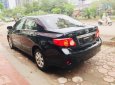 Toyota Corolla altis 2010 - Cần bán Toyota Corolla Altis đời 2010, màu đen