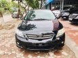 Toyota Corolla altis 2010 - Cần bán Toyota Corolla Altis đời 2010, màu đen