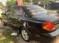 Kia Spectra 2004 - Cần bán lại xe Kia Spectra năm sản xuất 2004, màu đen giá cạnh tranh