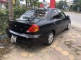 Kia Spectra 2004 - Cần bán lại xe Kia Spectra năm sản xuất 2004, màu đen giá cạnh tranh