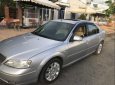 Ford Mondeo 2004 - Bán xe Ford Mondeo đời 2004, màu bạc, xe nhập số tự động