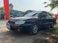 Kia Spectra 2004 - Cần bán lại xe Kia Spectra năm sản xuất 2004, màu đen giá cạnh tranh