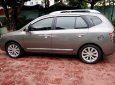 Kia Carens 2.0MT 2012 - Cần bán gấp Kia Carens 2.0MT 2012, màu bạc số sàn giá cạnh tranh