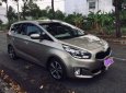 Kia Rondo 2016 - Bán ô tô Kia Rondo sản xuất 2016, màu vàng cát