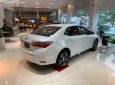 Toyota Corolla altis 1.8G AT 2019 - Bán ô tô Toyota Corolla Altis 1.8G AT sản xuất năm 2019, màu trắng giá cạnh tranh