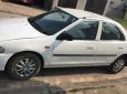 Mazda 323 2000 - Cần bán Mazda 323 đời 2000, màu trắng