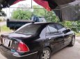 Ford Laser   Ghia   2004 - Cần bán xe Ford Laser Ghia sản xuất năm 2004, màu đen