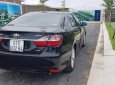 Toyota Camry 2.0E 2017 - Cần bán Toyota Camry đời 2017, màu đen, giá 900tr