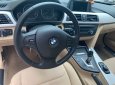 BMW 3 Series 320i 2014 - Cần bán xe BMW 320i 2014 ĐK 2015, số tự động, màu trắng