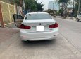 BMW 3 Series 320i 2014 - Cần bán xe BMW 320i 2014 ĐK 2015, số tự động, màu trắng