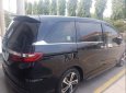 Honda Odyssey 2016 - Cần bán lại xe Honda Odyssey sản xuất năm 2016, màu đen