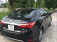 Toyota Corolla altis 2014 - Cần bán xe Toyota Corolla altis sản xuất năm 2014, màu đen