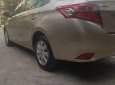 Toyota Vios 2016 - Gia đình cần bán Toyota Vios SX 2016 số tự động, màu vàng cát