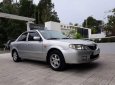 Mazda 323 2004 - Bán Mazda 323 sản xuất năm 2004, màu bạc, xe nhập