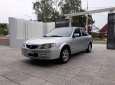 Mazda 323 2004 - Bán Mazda 323 sản xuất năm 2004, màu bạc, xe nhập