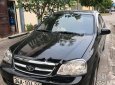 Daewoo Lacetti 2010 - Cần bán lại xe Daewoo Lacetti 2010, màu đen