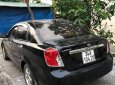 Daewoo Lacetti 2010 - Cần bán lại xe Daewoo Lacetti 2010, màu đen