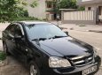 Daewoo Lacetti 2010 - Cần bán lại xe Daewoo Lacetti 2010, màu đen