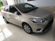 Toyota Vios 2016 - Cần bán xe Toyota Vios 1.5E 2016 số tự động màu vàng cát